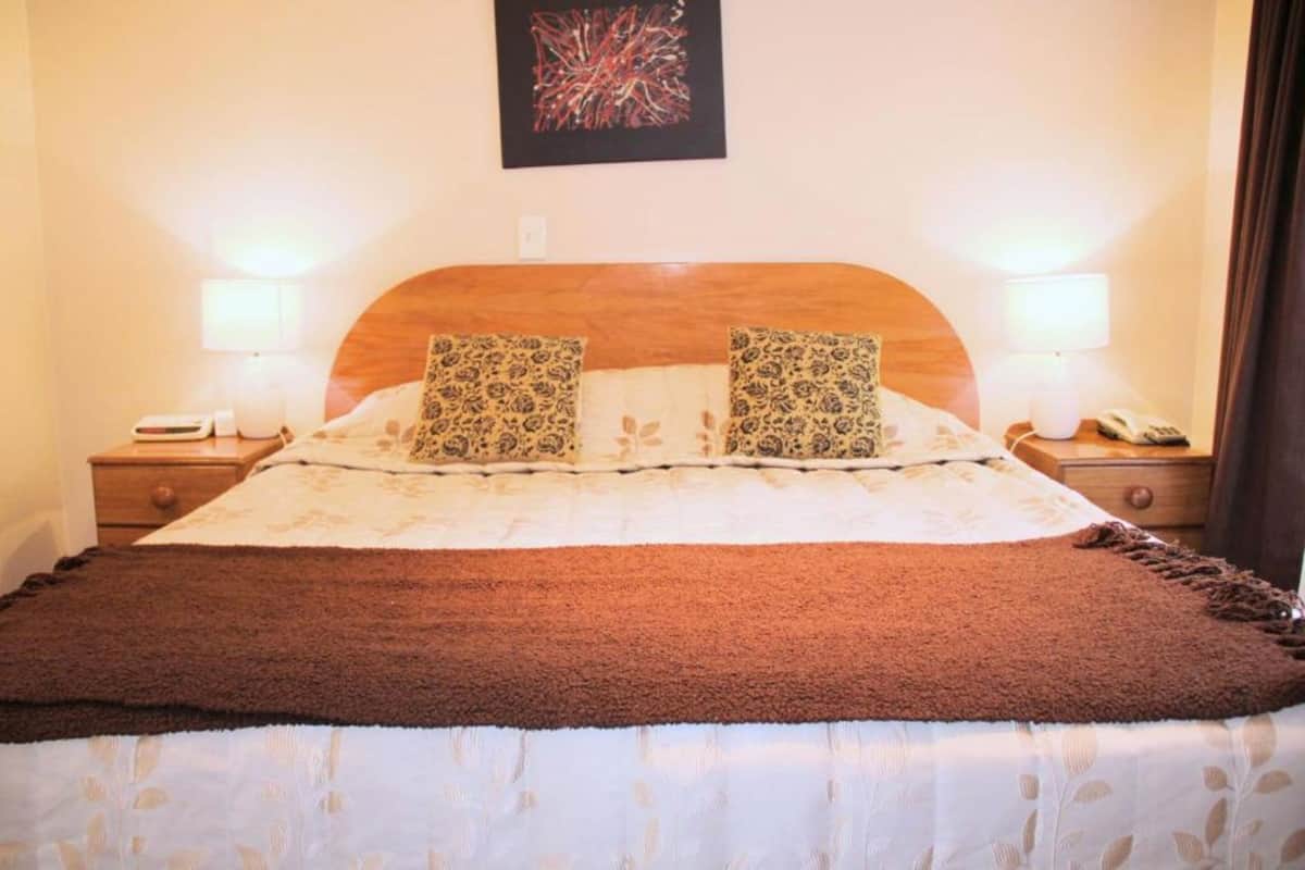 Premium bedding, laptop workspace, soundproofing, iron/ironing board