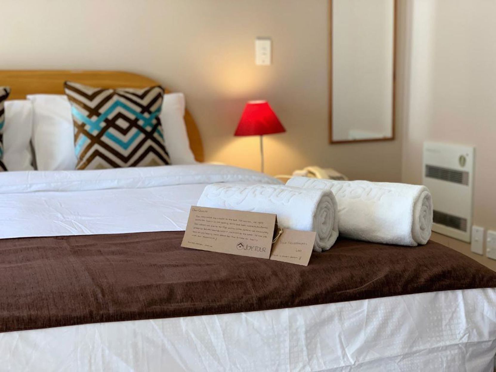 Premium bedding, laptop workspace, soundproofing, iron/ironing board