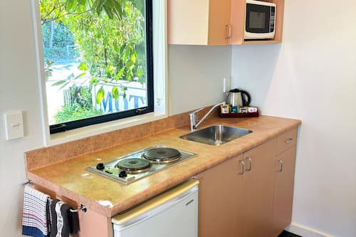Fridge, microwave, electric kettle, toaster