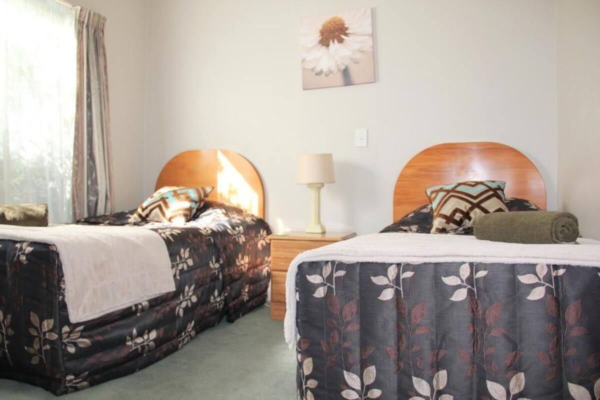 Premium bedding, laptop workspace, soundproofing, iron/ironing board