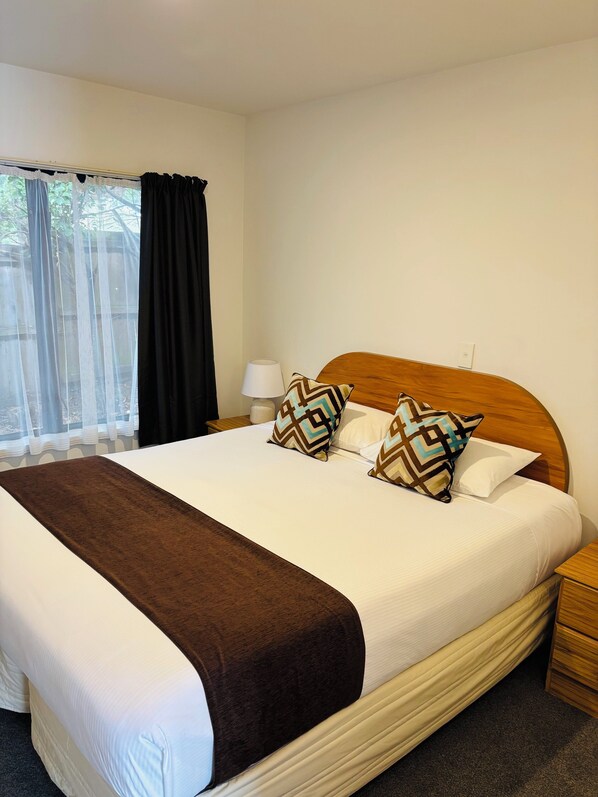 Premium bedding, laptop workspace, soundproofing, iron/ironing board