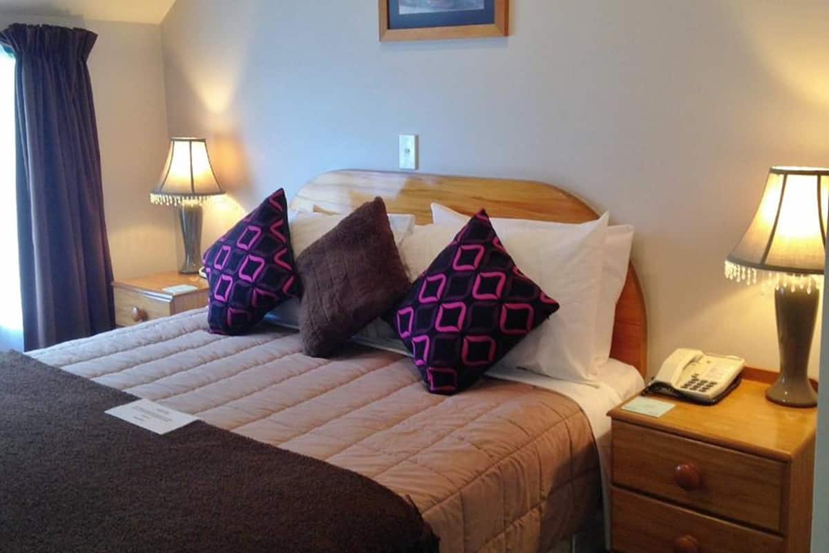 Premium bedding, laptop workspace, soundproofing, iron/ironing board