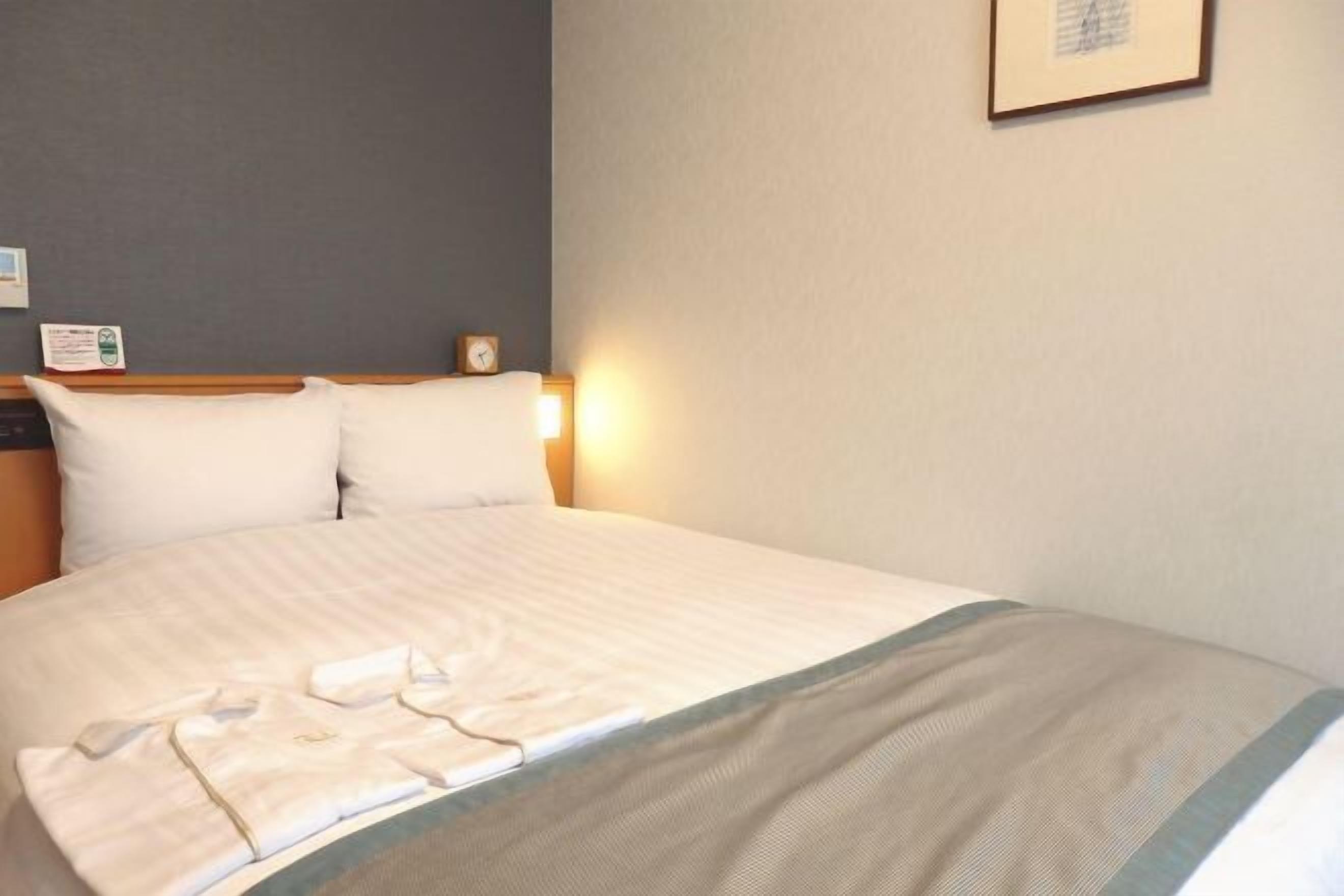 Down comforters, desk, laptop workspace, blackout drapes