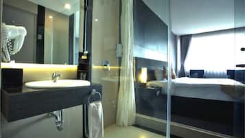 Shower, free toiletries, hair dryer, towels