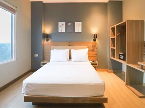 Deluxe Room, City View | In-room safe, iron/ironing board, free WiFi, bed sheets