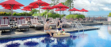 Outdoor pool, pool umbrellas, sun loungers