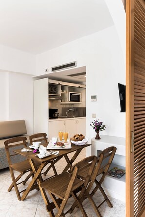 Apartment | Private kitchen | Fridge, dining tables - Esperia City Hotel (Rhodes)