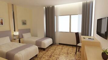 A hotel room with two beds, a desk, a TV, and a window with curtains.