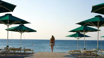 Private beach, sun loungers, beach umbrellas, beach towels