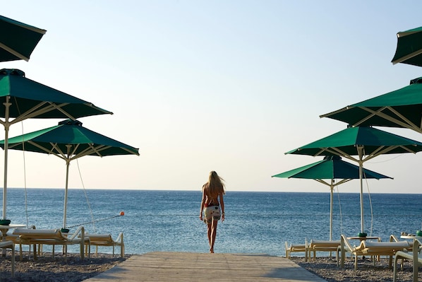 Private beach, sun loungers, beach umbrellas, beach towels