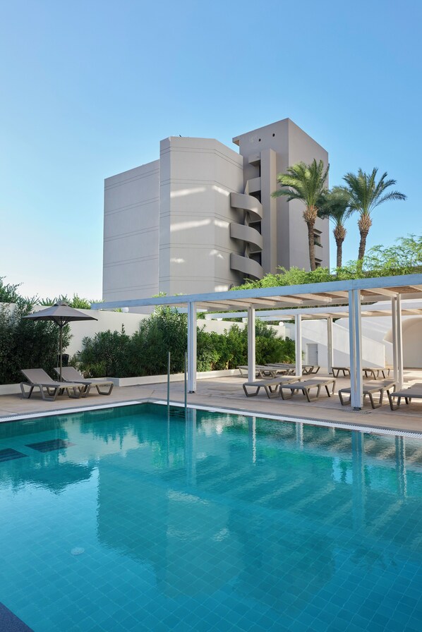 Outdoor pool, pool umbrellas, pool loungers