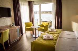 Televisión de pantalla plana, piso con calefacción