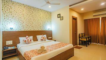 Habitación Deluxe | Sábanas de algodón egipcio, ropa de cama de alta calidad y edredón