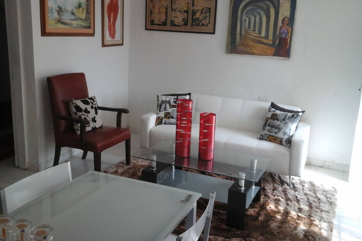 Standard Double Room | Living room | Flat-screen TV