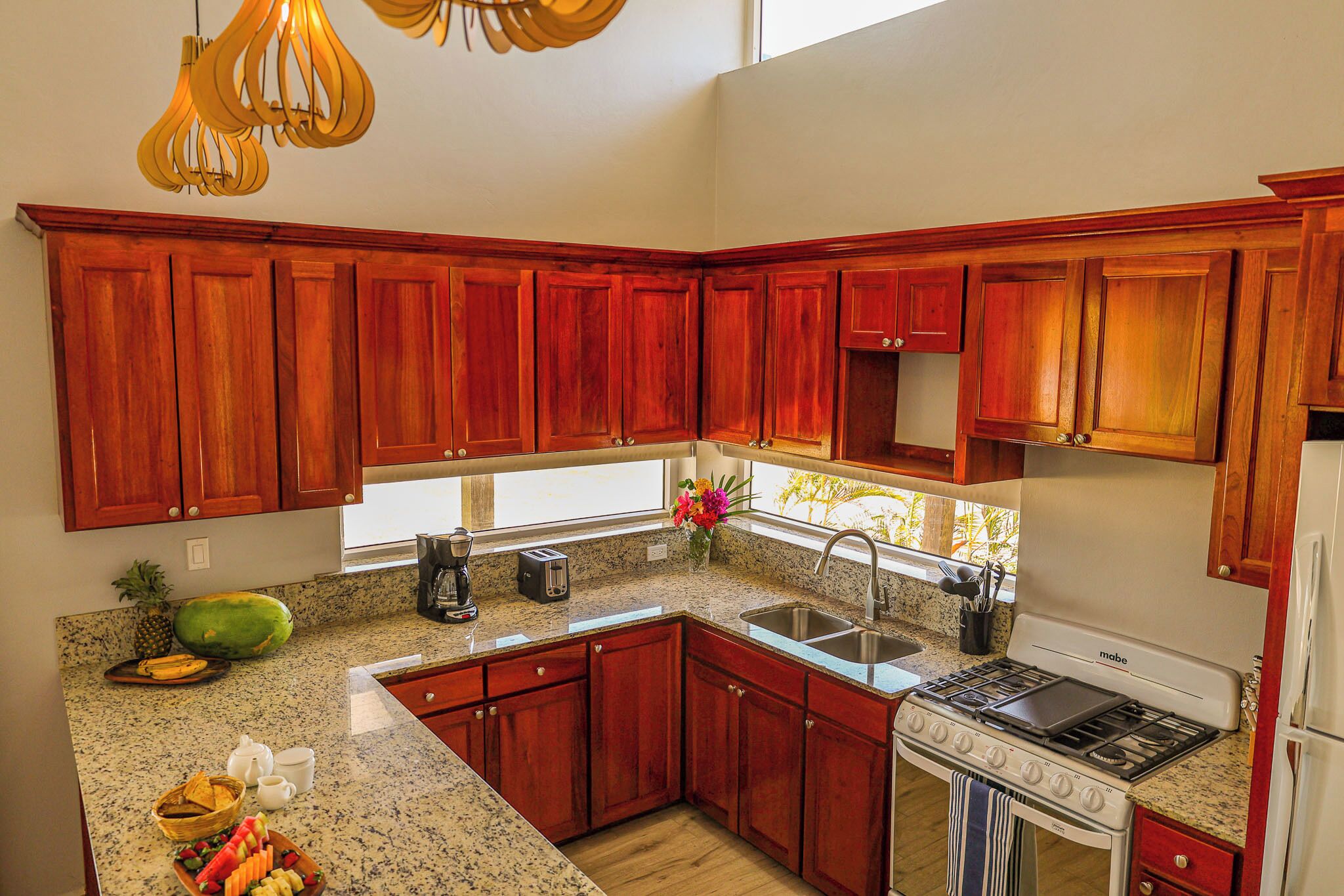 three bedroom beachfront villa | private kitchen | full-sized fridge, oven, stovetop, coffee/tea maker