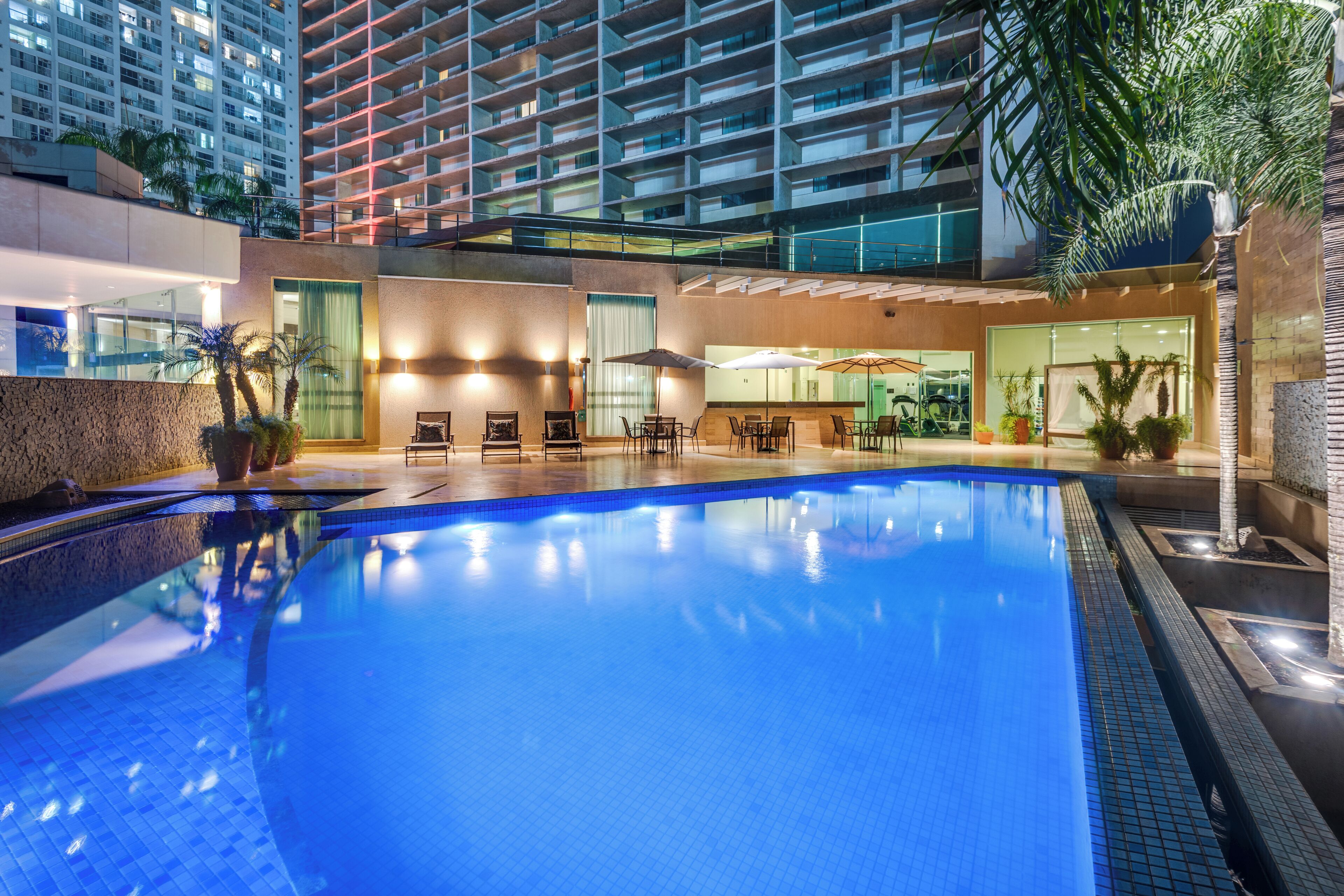 outdoor pool, pool umbrellas, pool loungers