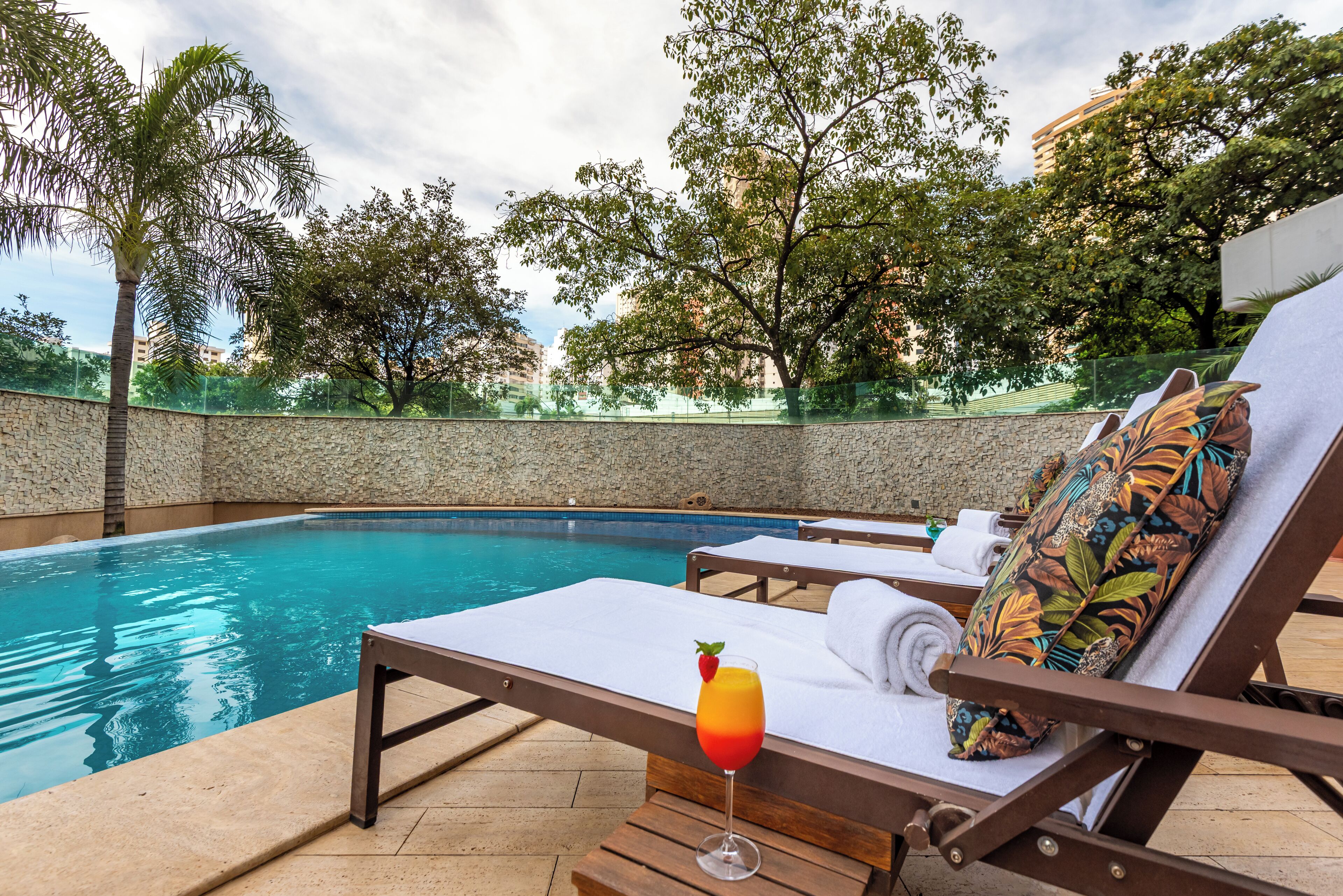 outdoor pool, pool umbrellas, pool loungers