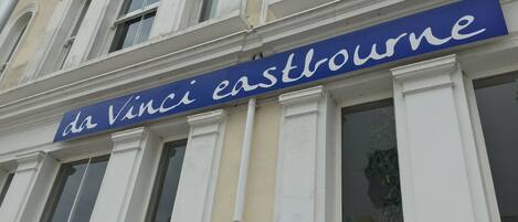 A building facade with a sign reading "da Vinci Eastbourne".