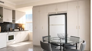 City Penthouse | Private kitchen | Coffee/tea maker, full-size fridge, microwave, oven