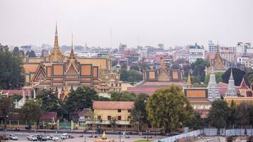 A large temple complex with multiple golden spires and traditional architecture.