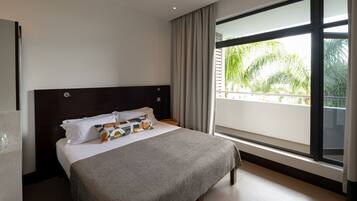 Down comforters, memory foam beds, minibar, in-room safe