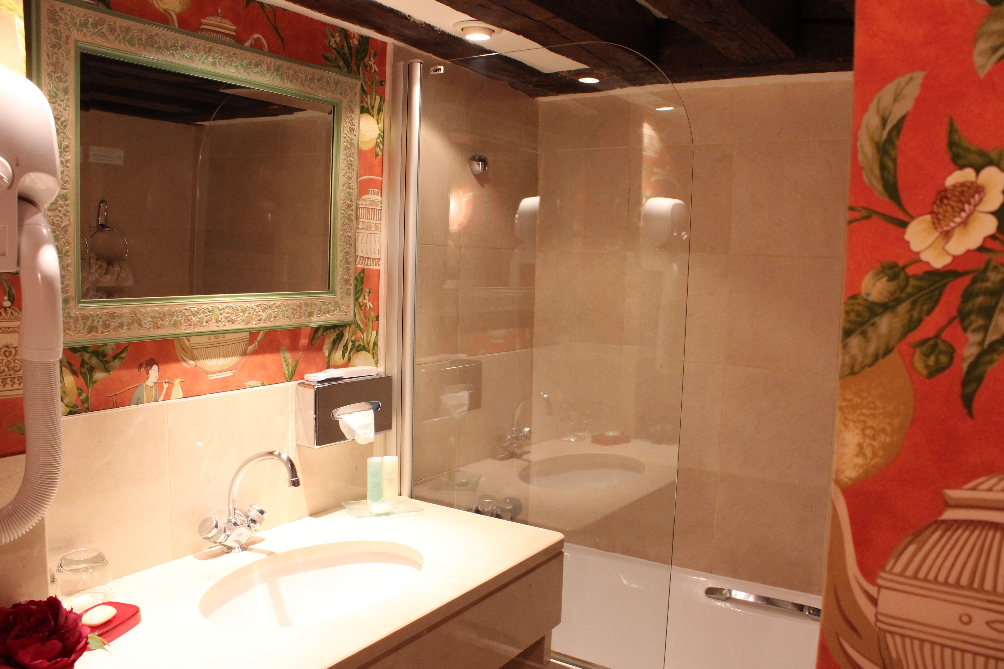 bathtub, free toiletries, hair dryer, towels