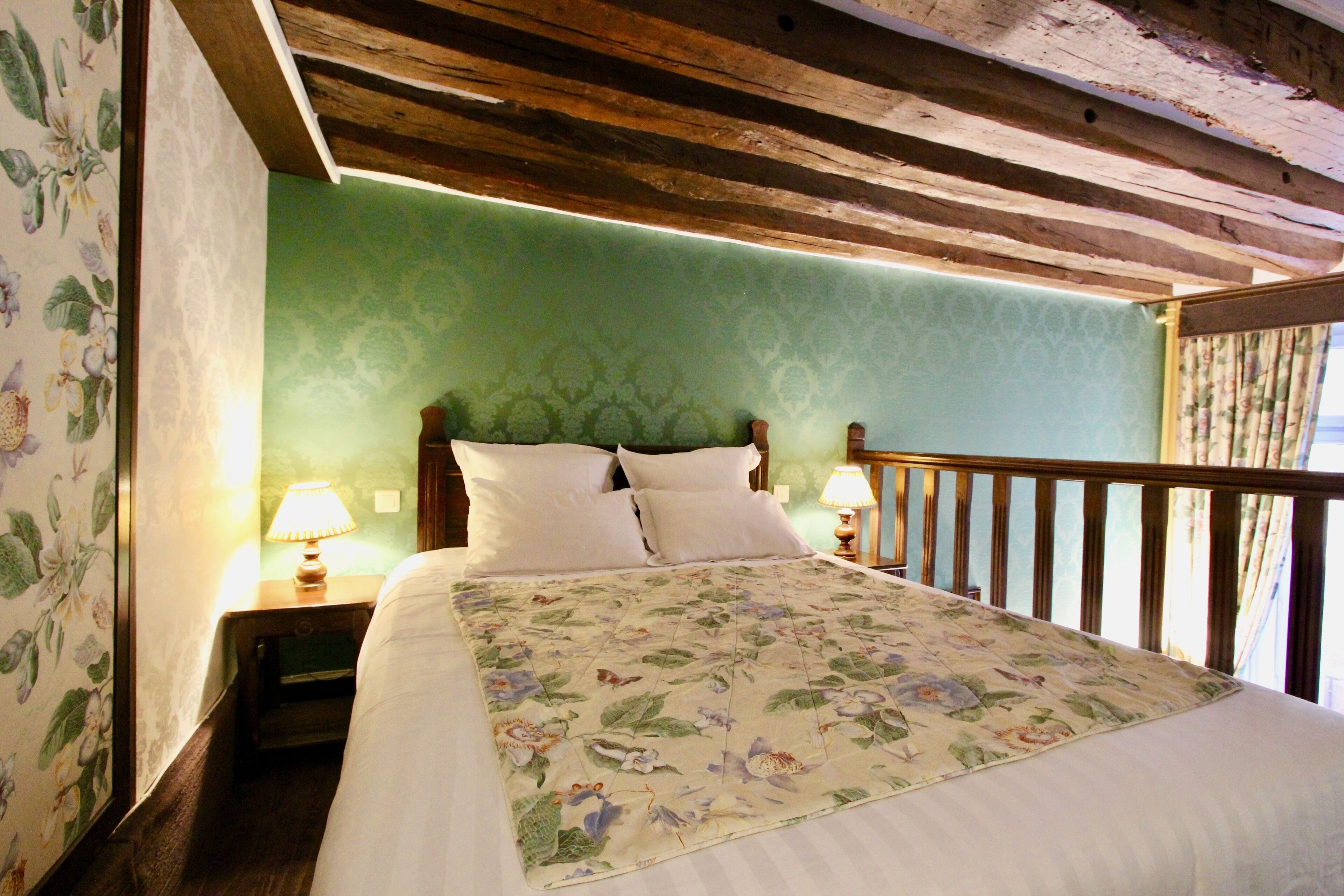 family room | premium bedding, minibar, in-room safe, individually decorated