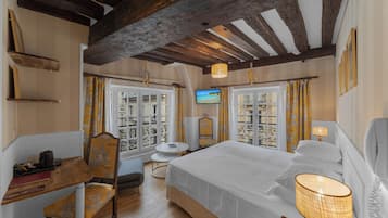 Suite júnior | Roba de llit d'alta qualitat, minibar i caixa forta a l'habitació