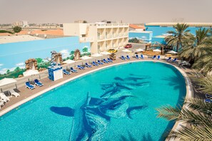 Indoor pool, outdoor pool, open 8 AM to 9:00 PM, pool umbrellas - Royal Residence Hotel & Spa (Umm al Quwain)