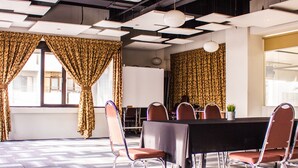 A conference room with a long table, chairs, and a patterned carpet. - The 5 Elements Hotel (Kuala Lumpur)