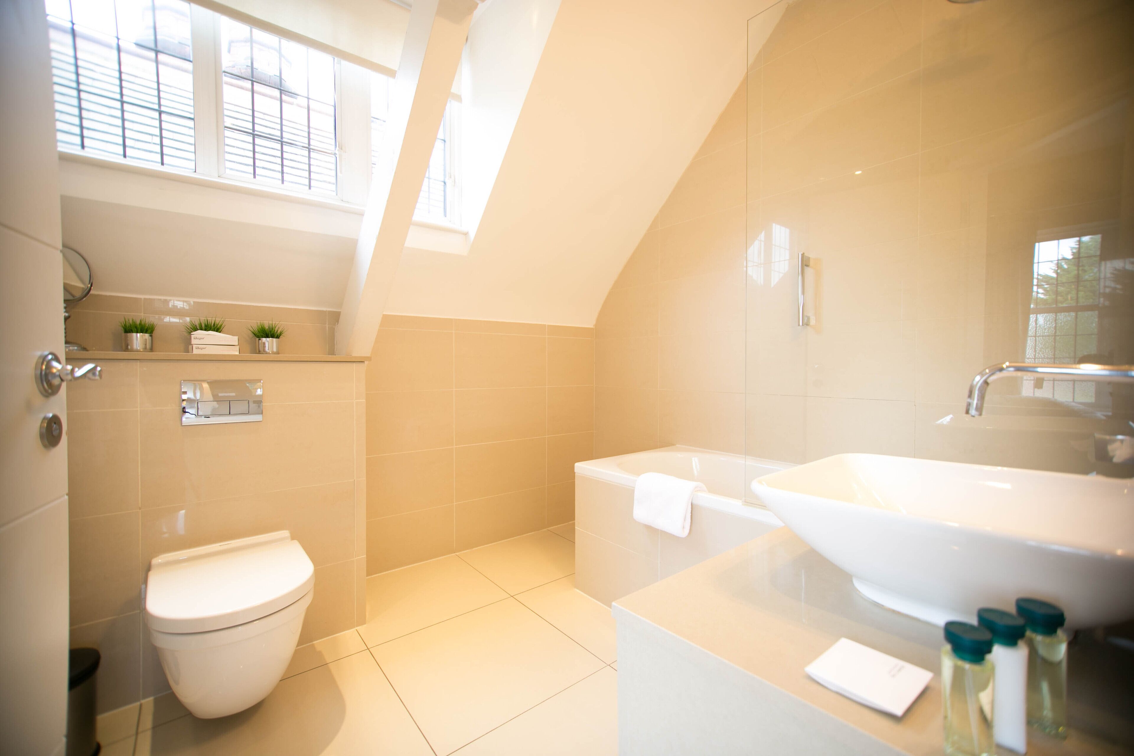 executive double or twin room | bathroom | designer toiletries, hair dryer, towels, soap