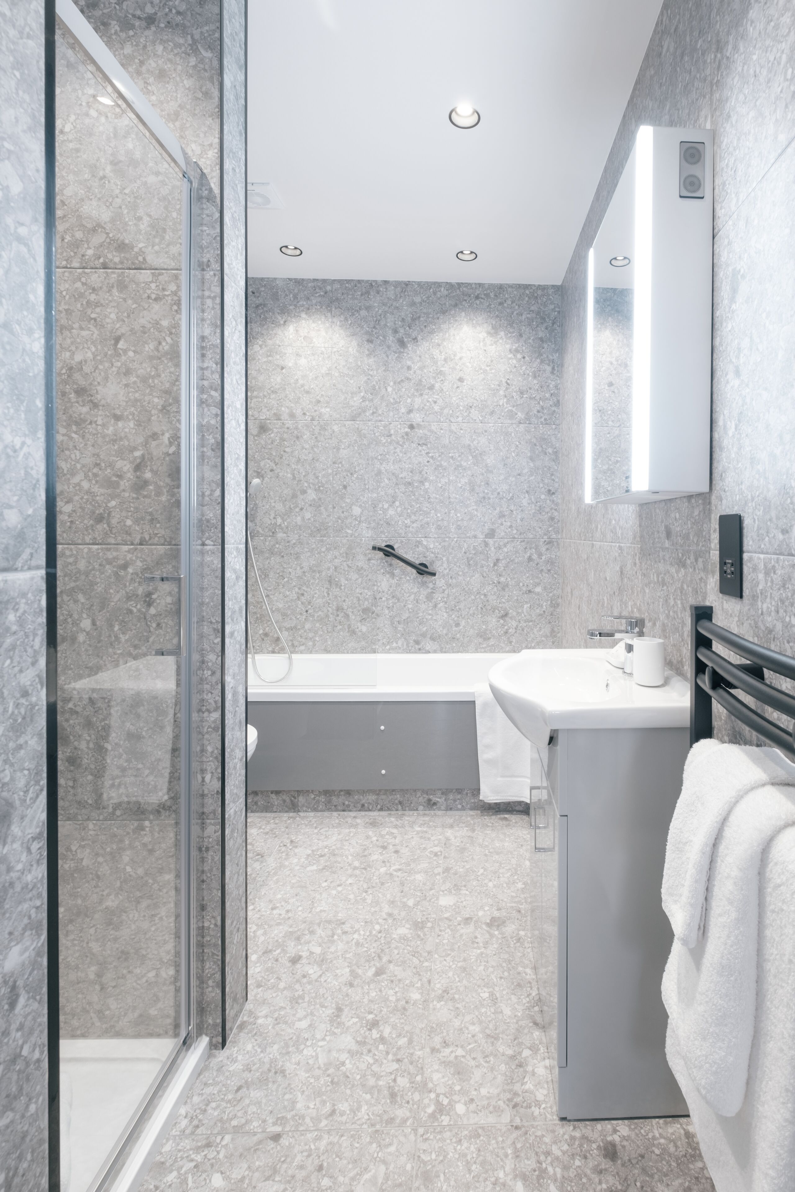 executive room | bathroom | designer toiletries, hair dryer, towels, soap