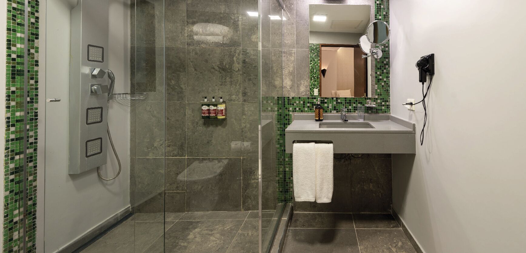 shower, rainfall showerhead, hair dryer, towels