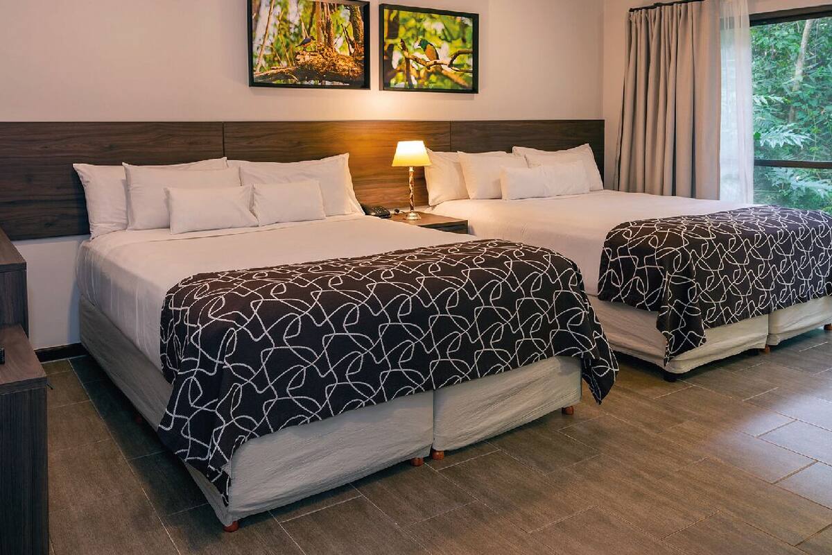 classic room, 2 queen beds | 1 bedroom, minibar, in-room safe, bed sheets