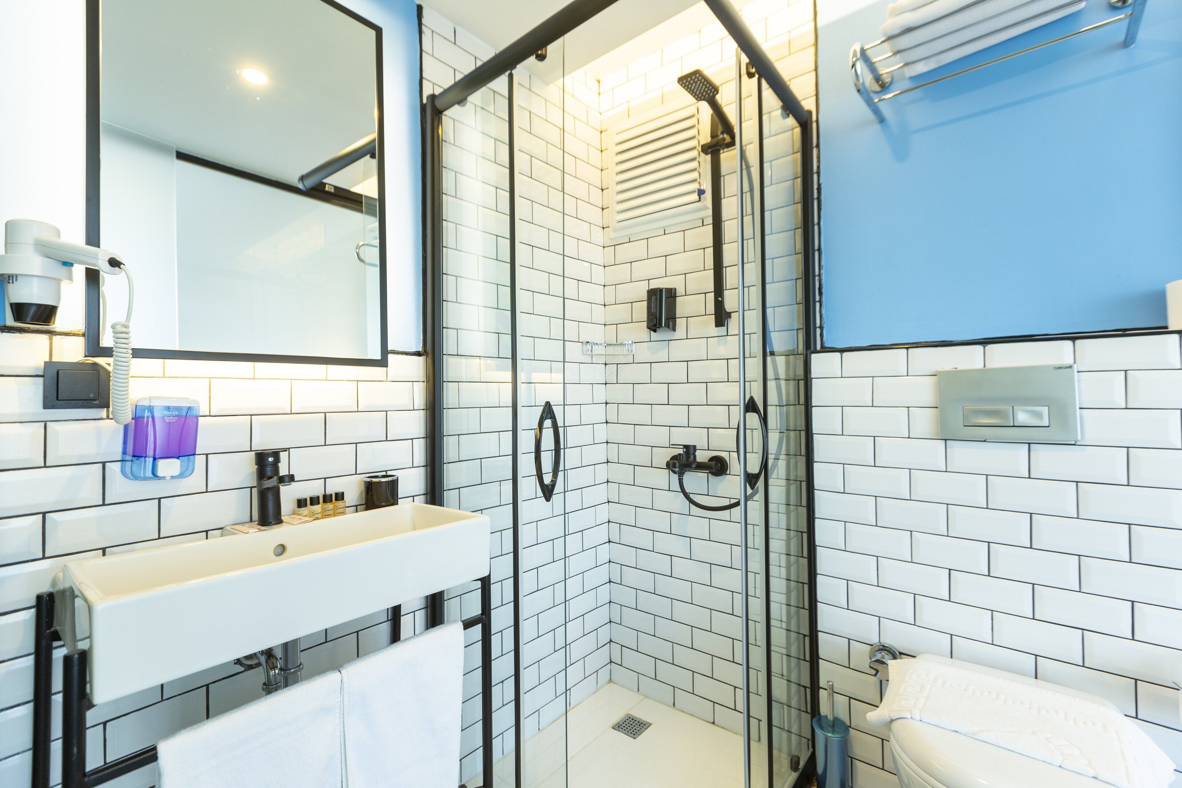 shower, free toiletries, hair dryer, slippers