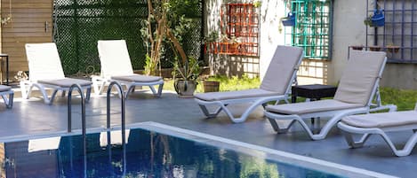 Outdoor pool, pool loungers