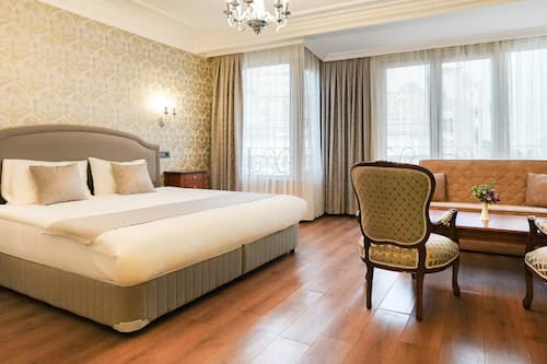 Family Quadruple Room, City View | Premium bedding, down duvets, minibar, in-room safe