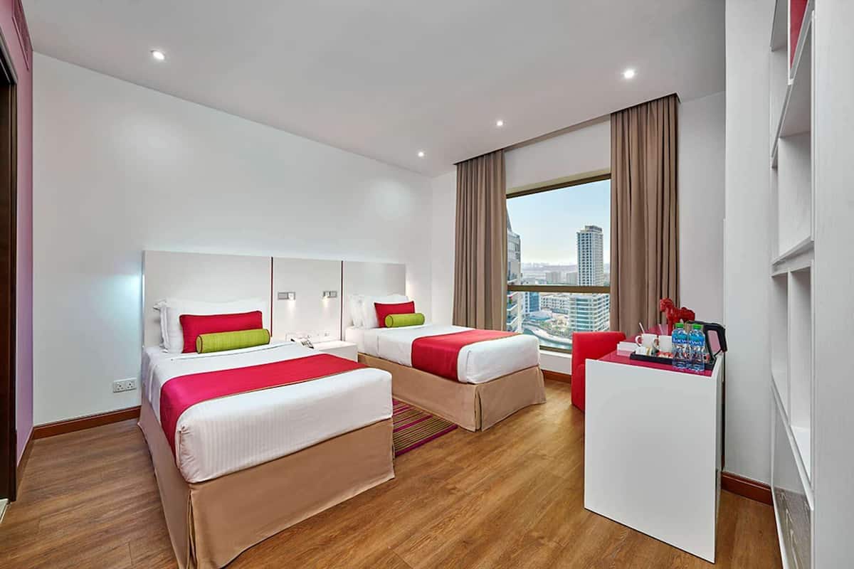 Deluxe Room, 2 Single Beds | Down duvets, minibar, in-room safe, individually decorated