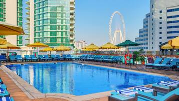 Outdoor pool, pool umbrellas, sun loungers