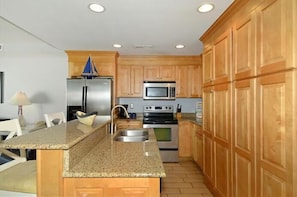 Full-size fridge, microwave, stovetop, dishwasher