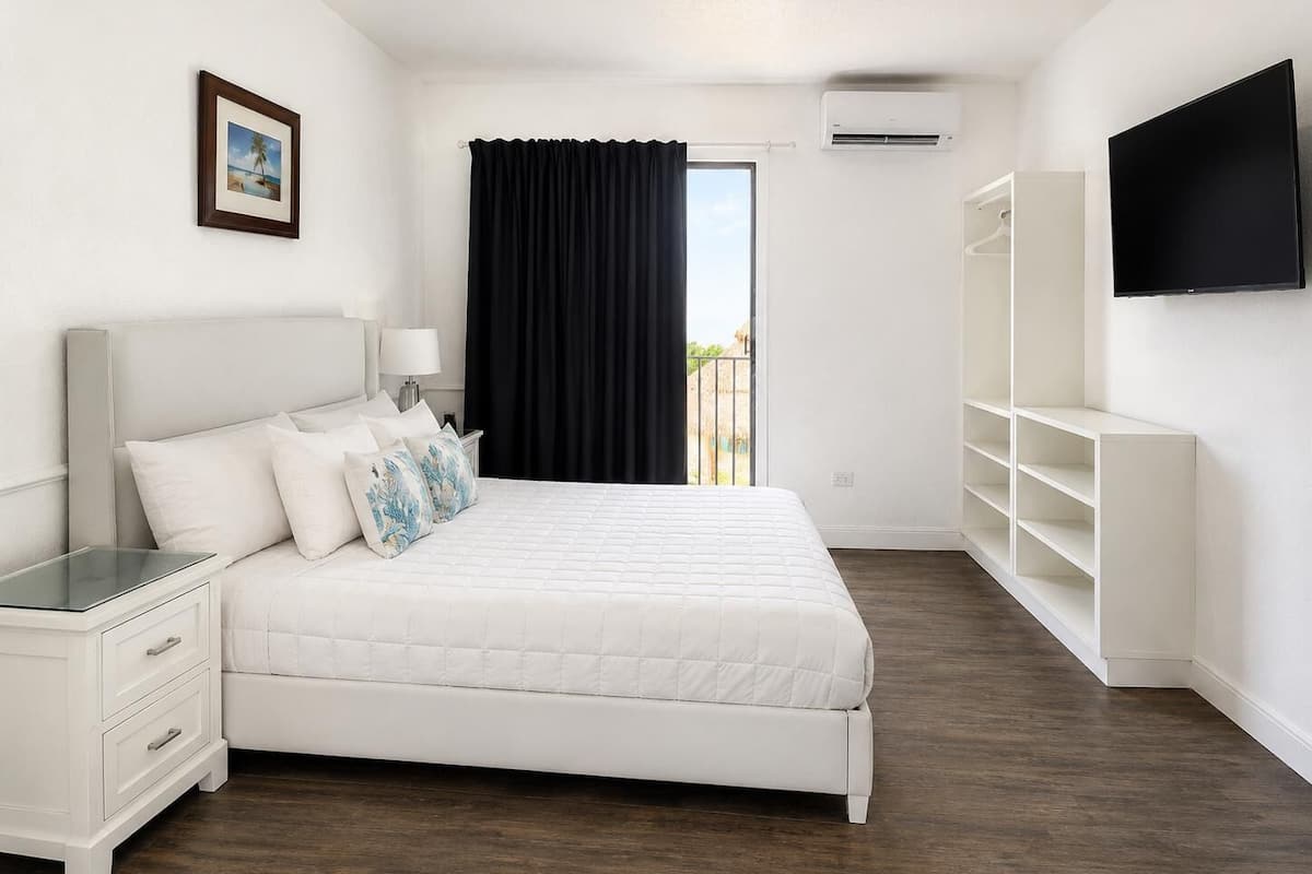 Suite, Multiple Beds, Non Smoking | Blackout drapes, iron/ironing board (on request), WiFi (free)