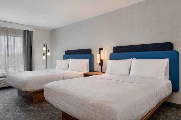 Room, 2 Queen Beds | In-room safe, desk, laptop workspace, blackout drapes