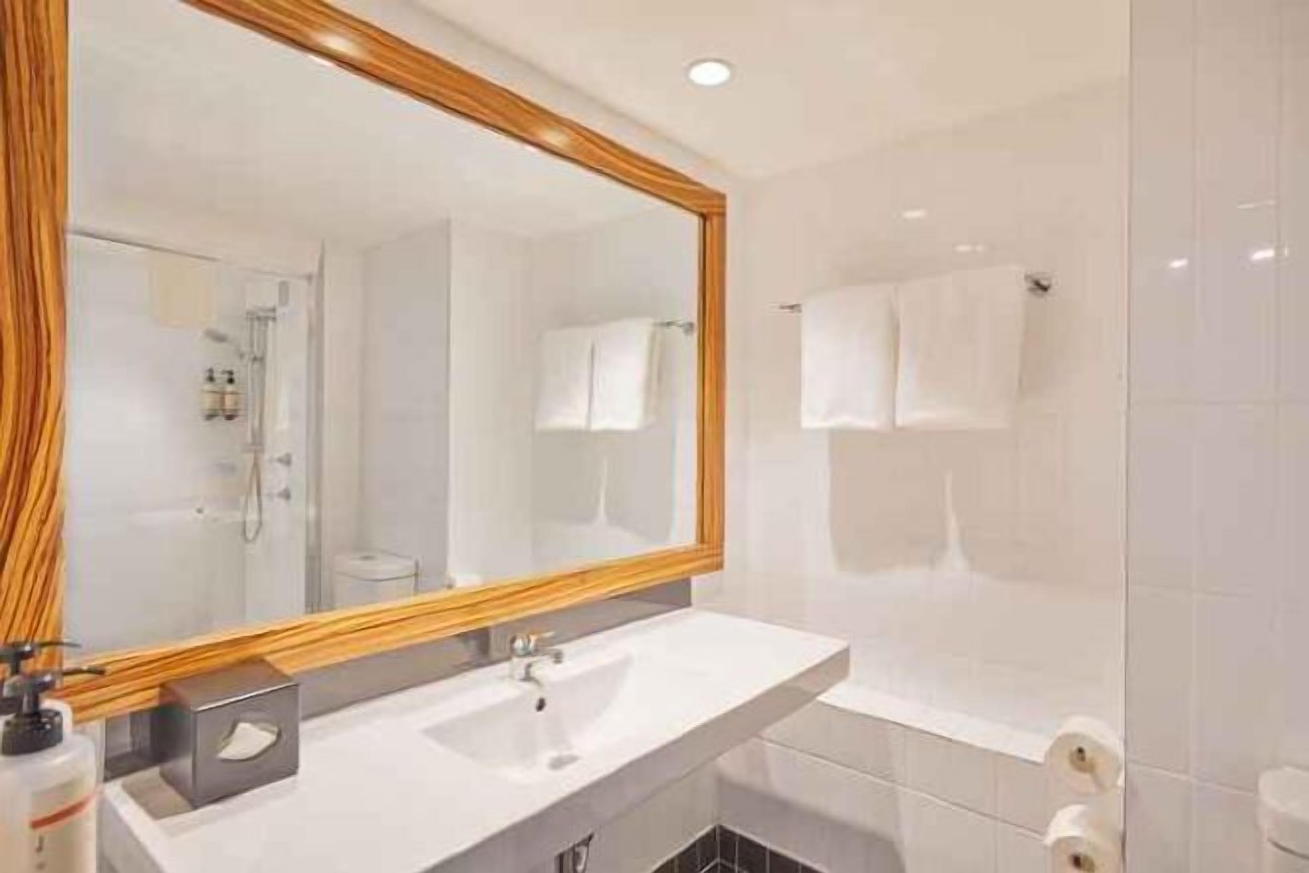 Designer toiletries, hair dryer, towels, soap