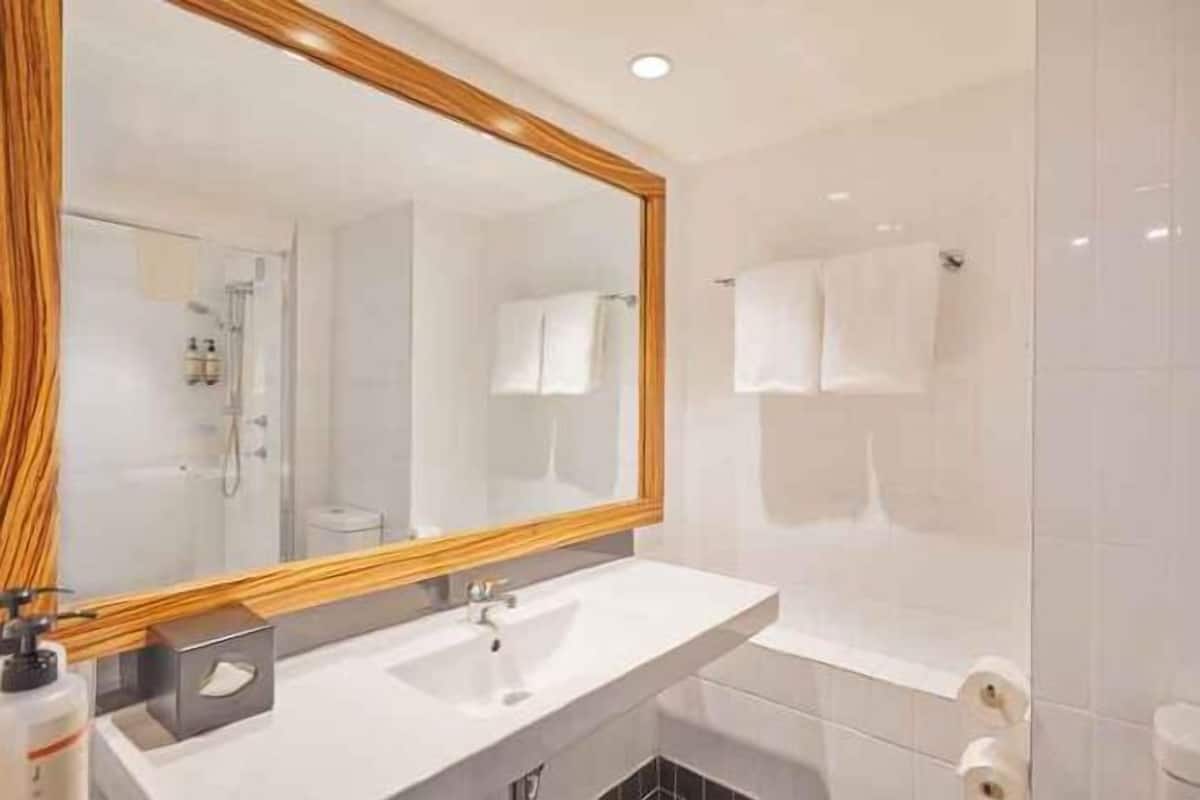 Designer toiletries, hair dryer, towels, soap