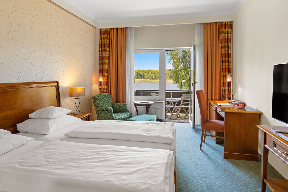 double room, lake view | individually decorated, desk, laptop workspace, free wifi