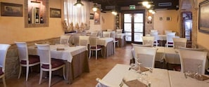 Breakfast, lunch, dinner served; local cuisine, garden views
