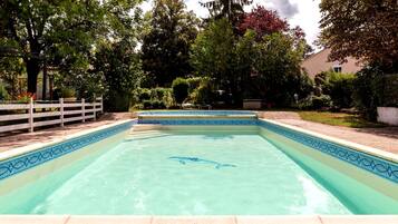 Outdoor pool, pool umbrellas, pool loungers