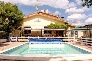 Outdoor pool, pool umbrellas, pool loungers