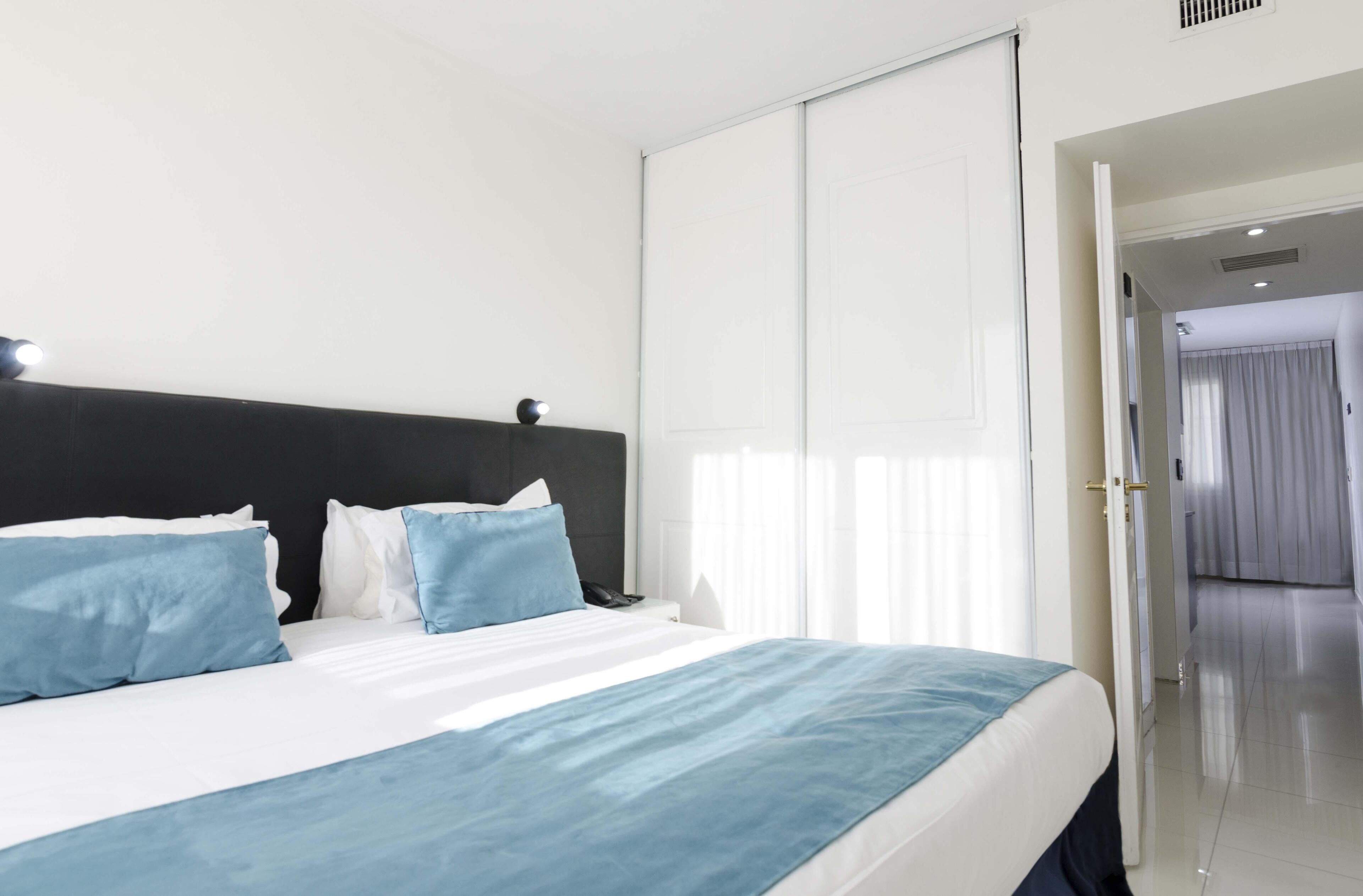 Premium bedding, down duvets, pillow-top beds, in-room safe