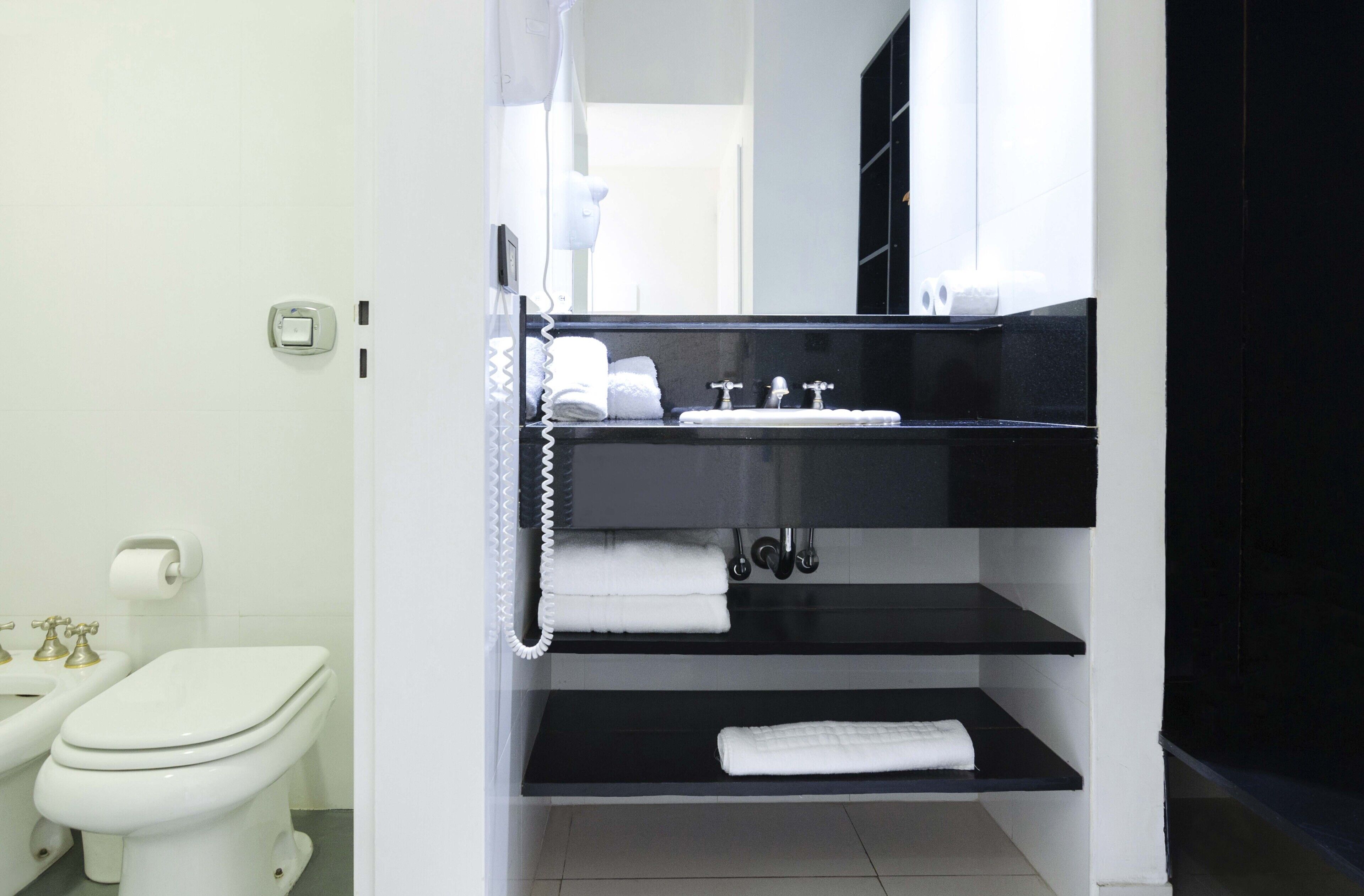 standard double room, city view | bathroom | combined shower/bathtub, rainfall showerhead, free toiletries